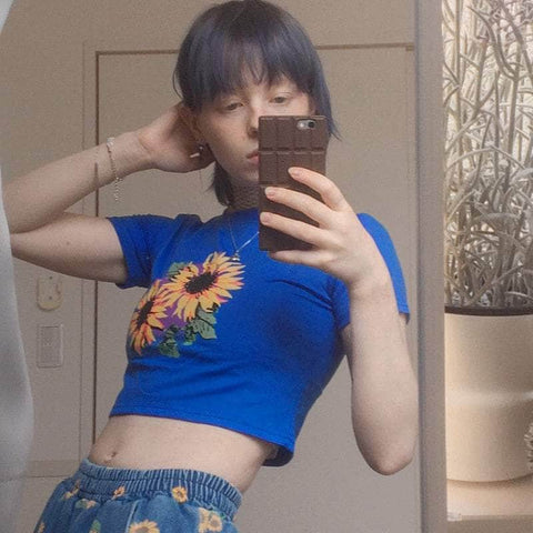 the flower that follows the sun or something CROP TOP